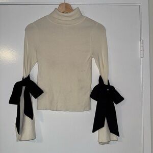 Anthropologie Top with Black Bow Sleeves
